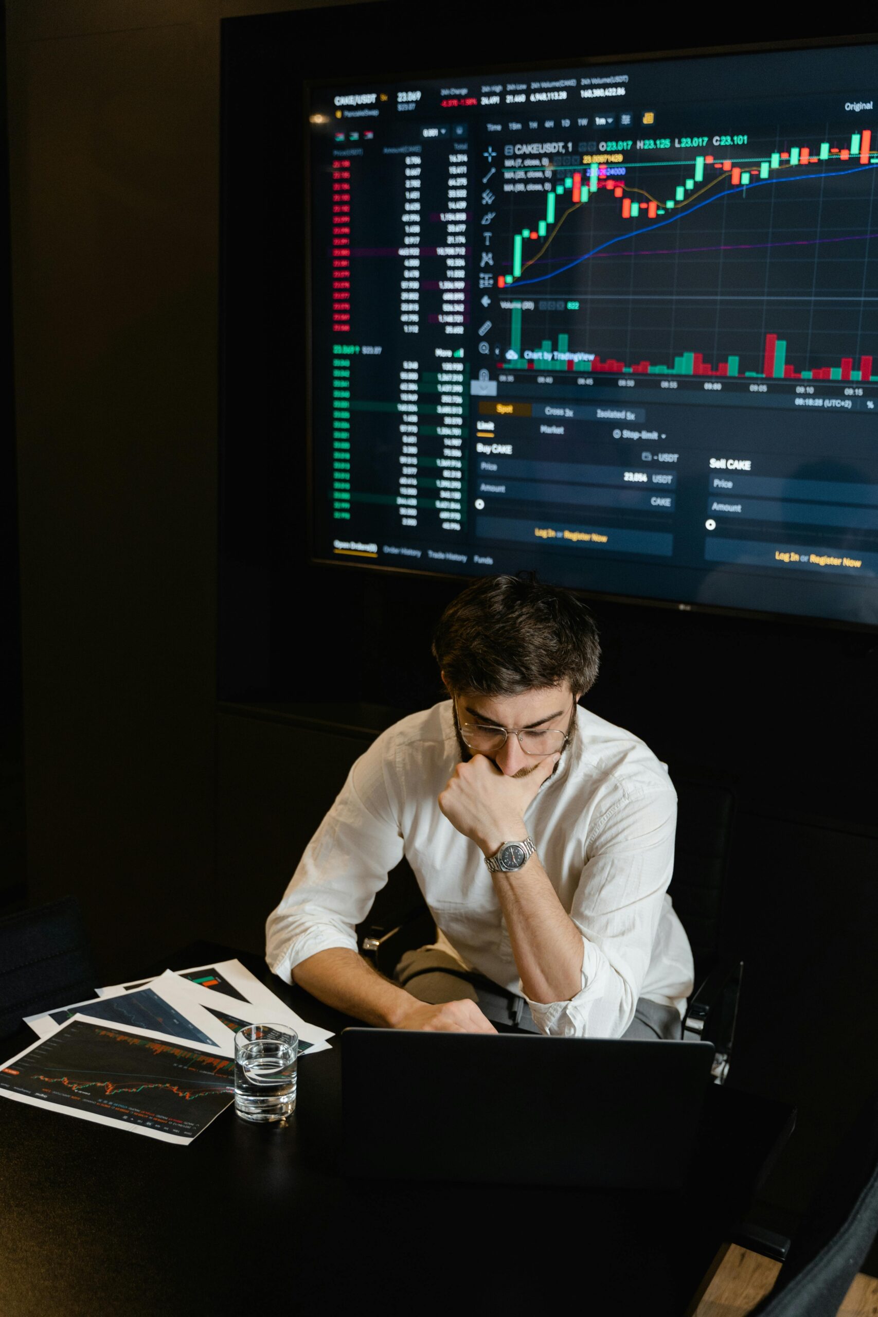 Man in White Dress Shirt Sitting in Front of Computer Monitor